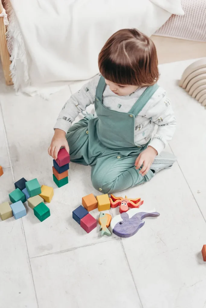 Child engaged in a developmental and behavioral screening activity
