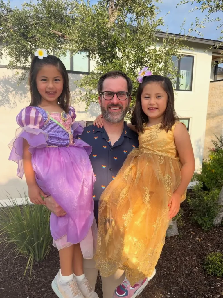 Dr. Mullins examining young patients at Priority Pediatrics